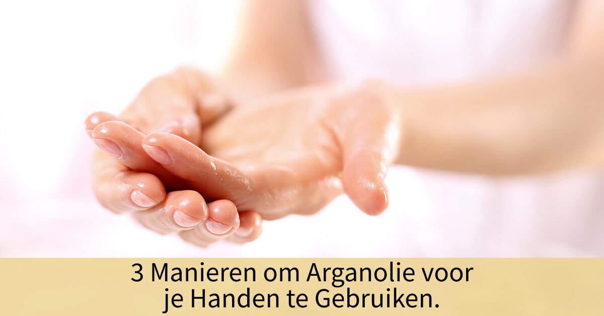 Vrouwenhanden met arganolie insmeren
