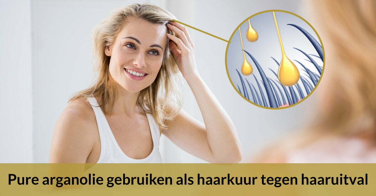 arganolie als haarkuur tegen haaruitval vrouw uitvergroot olie op haar